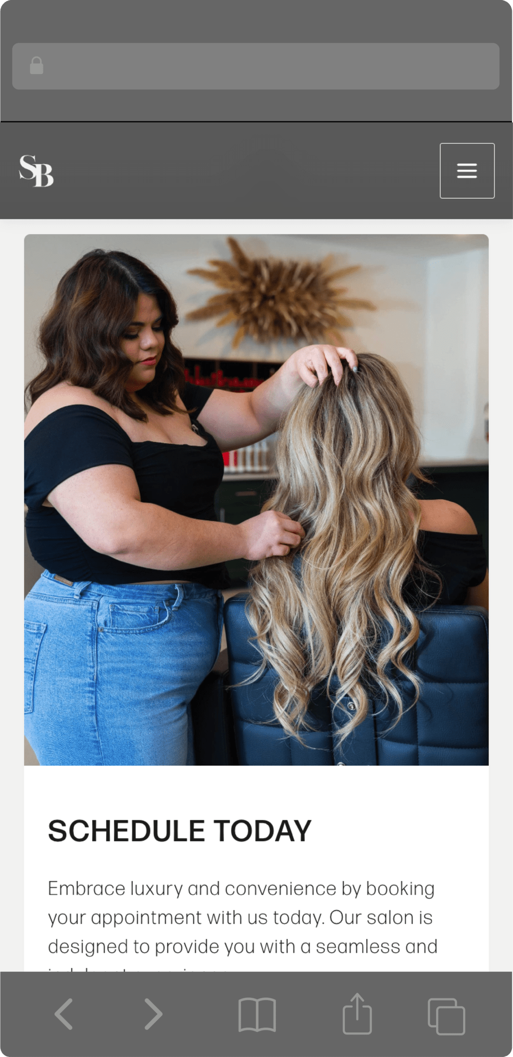 An image of Gaby working with a client's hair